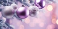 Christmas banner with violet colored tree baubles Royalty Free Stock Photo