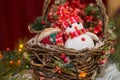 Christmas basket under the tree. Toy Santa Claus and Christmas basket Royalty Free Stock Photo