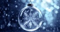 Christmas bauble with snowflakes on glittering light snowy blue bokeh background.Merry Christmas,Happy New Year greeting card. Royalty Free Stock Photo