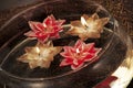 Christmas baubles, candles and other on background of defocused