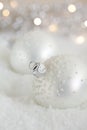 Christmas baubles in the snow Royalty Free Stock Photo