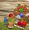 Christmas baubles and vary of decoration on wood background Royalty Free Stock Photo