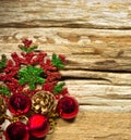 Christmas baubles and vary of decoration on wood background Royalty Free Stock Photo