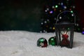 Christmas. A beautiful lantern on a background of colored lights Royalty Free Stock Photo