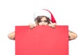 Christmas. Beautiful muscular sexual happy woman in Santa Claus clothes. Keeps blank whiteboard. Isolated on white