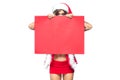 Christmas. Beautiful muscular sexual happy woman in Santa Claus clothes. Keeps blank whiteboard. Isolated on white