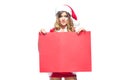 Christmas. Beautiful muscular sexual happy woman in Santa Claus clothes. Keeps blank whiteboard. Isolated on white