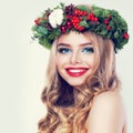 Christmas Beauty. Happy Model Woman with Blonde Permed Hairstyle