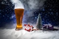 Christmas Beer on snow with decorative artwork Royalty Free Stock Photo