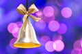 Christmas bell on the background of bokeh lights with copy space Royalty Free Stock Photo