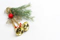 Christmas bell with red ball on fir branch