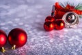 Christmas bell with red balls on a gray background6