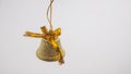 Christmas bell, yellow on a white background