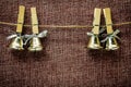 Christmas Bells hanging on the object on the background of vintage textiles