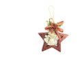 Christmas bells and star accessory on white background.