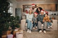 Christmas, big family and portrait smile in living room on sofa in home, bonding and care. Xmas, interracial and happy