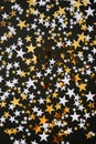 Christmas or birthday stars background, gold and black glow