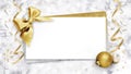 Christmas Blank gift greeting card ticket with shiny golden bow and balls, background with bright ribbons on bokeh lights and