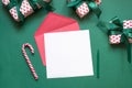 Christmas blank for letter to Santa on green. Invitation. Space for wishes. Top view Royalty Free Stock Photo