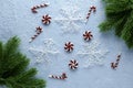 christmas blue background with fir twigs candies and snowflakes Royalty Free Stock Photo