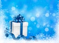Christmas blue background with gift box and snowfl
