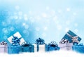 Christmas blue background with gift boxes