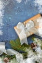 Christmas blue background with gift boxes and xmas tree. Royalty Free Stock Photo