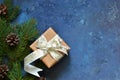 Christmas blue background with gift boxes and xmas tree. Royalty Free Stock Photo