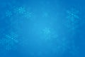 Christmas blue background with glowing snowflakes and bokeh. vertor illustration