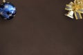 Christmas blue ball and decorative bell on dark background Royalty Free Stock Photo