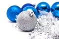 Christmas blue ball in focus and blue balls in background with Royalty Free Stock Photo