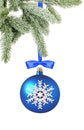 Christmas blue ball and tree branch isolated over white background Royalty Free Stock Photo
