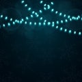 Christmas blue lights on a dark background. Snowflakes on the background. Celebratory background. Blue garlands. Luminous oval lig Royalty Free Stock Photo