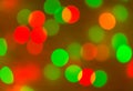 Christmas bokeh background, copy space. Defocused new year bokeh lights, free space. Blurred red and green bokeh. Royalty Free Stock Photo