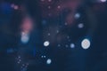 Christmas bokeh night background vintage New year with defocused Christmas lights black blue pink lilac colors Royalty Free Stock Photo