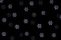 Christmas bokeh overlay background. Blue snowflakes light on the black background. New Year, festive, winter atmosphere Royalty Free Stock Photo