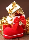 Christmas boot with presents Royalty Free Stock Photo