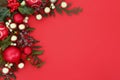 Christmas Border with Baubles Holly and Winter Greenery Royalty Free Stock Photo