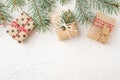 Christmas border of christmas gift boxes & spruce branches on white background Royalty Free Stock Photo