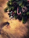 Christmas border design on the wooden background. Christmas fir tree with christmas candle and decoration Royalty Free Stock Photo