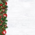 Christmas border with fir branches, balls, holly and cones ÃÂ¾n w Royalty Free Stock Photo