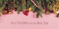 Christmas border with fir branches, conifer cones, christmas balls and golden christmas ornaments Royalty Free Stock Photo