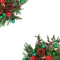 Christmas Border with Green Baubles and Winter Greenery Royalty Free Stock Photo