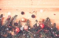 Christmas border made of fir branches, decorations and gifts. Vintage style. Royalty Free Stock Photo
