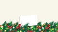 Christmas border. Pine tree branch, Christmas balls, Red berries, Star, Sparkling lights, and Blank paper for your text. Royalty Free Stock Photo