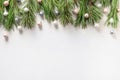 Christmas border with silver and pink balls, evergreen branches on white. Xmas greeting card Royalty Free Stock Photo