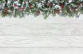 Christmas Border with Snow Covered Red Berries and Fir Royalty Free Stock Photo