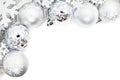 Christmas border of snowflakes and silver baubles Royalty Free Stock Photo