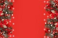 Christmas border of toys, gift box, ribbons and snowflakes on red background Royalty Free Stock Photo