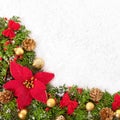 Christmas border with traditional decorations and poinsettia on t Royalty Free Stock Photo